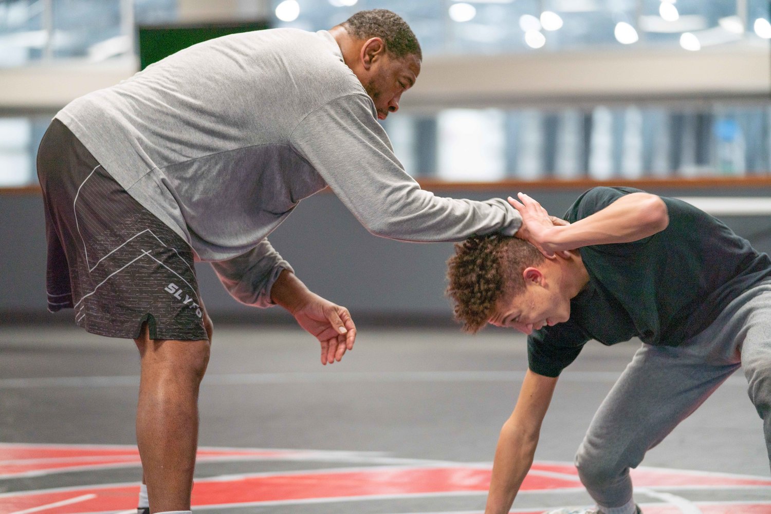 SPIRE Institute & Academy's Josh Miller (right) practices drills with head coach Kenny Monday. Monday; an Olympic medalist; called Miller 'a special kid' when asked about his recruitment of Miller to Ohio.